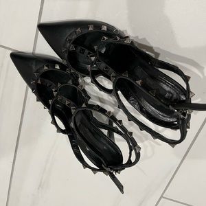 Valentino heels size 35 in a half. Black color. Studded. Used in fair condition.